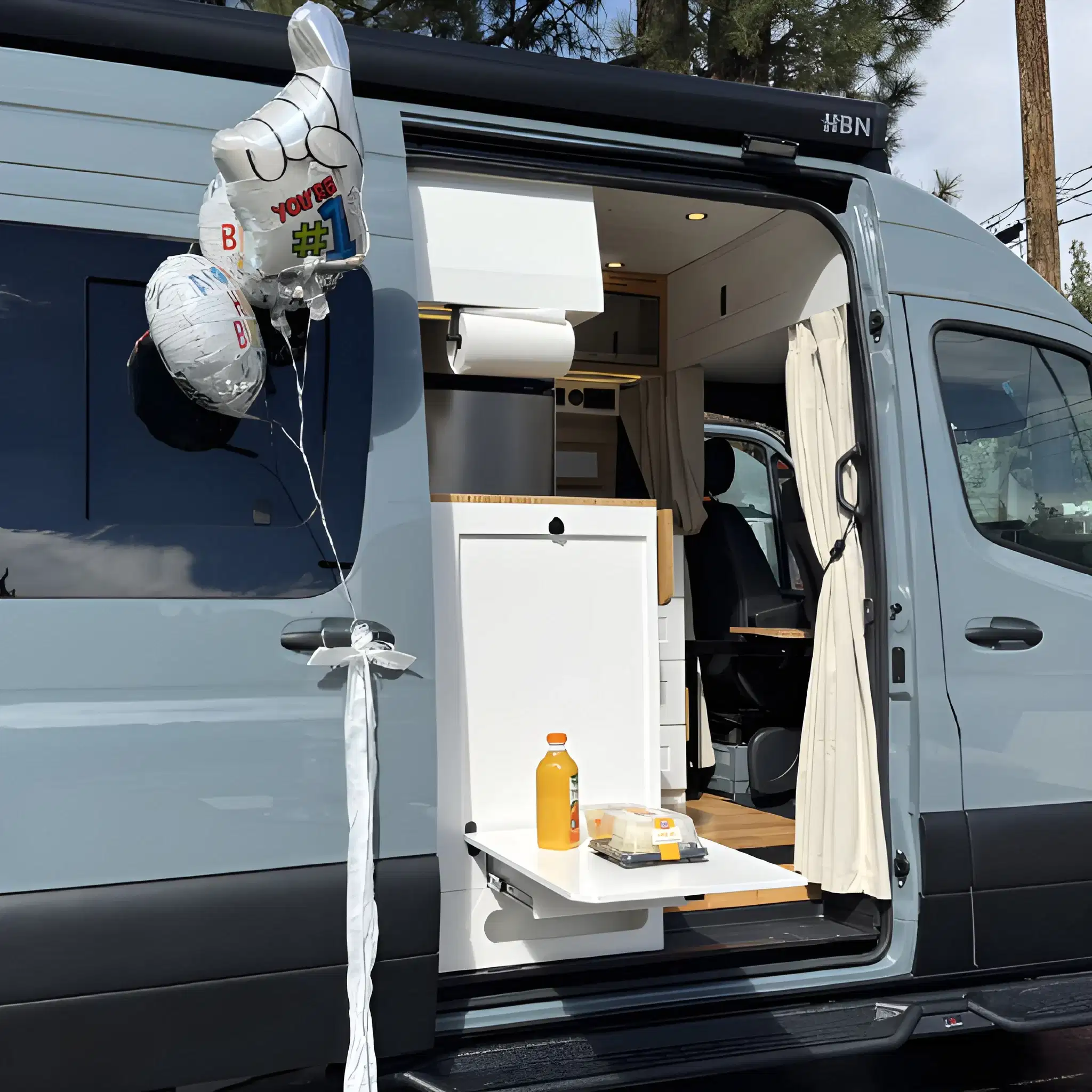 A converted camper van in a scenic location