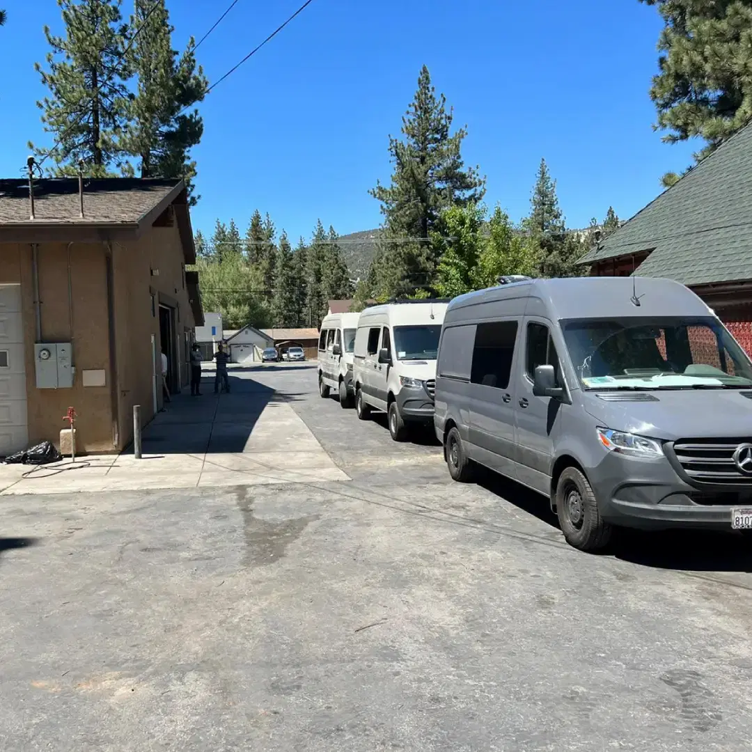 Vans parked in a row